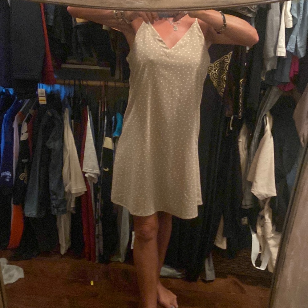 Poka-dots. This is a dress that can be worn anywhere. It is classy